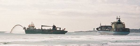  Dredger pumping sand